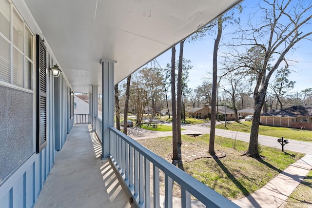 balcony with a porch and a residential view