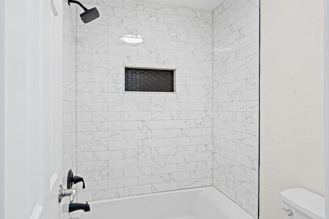 full bathroom with bathtub / shower combination and toilet