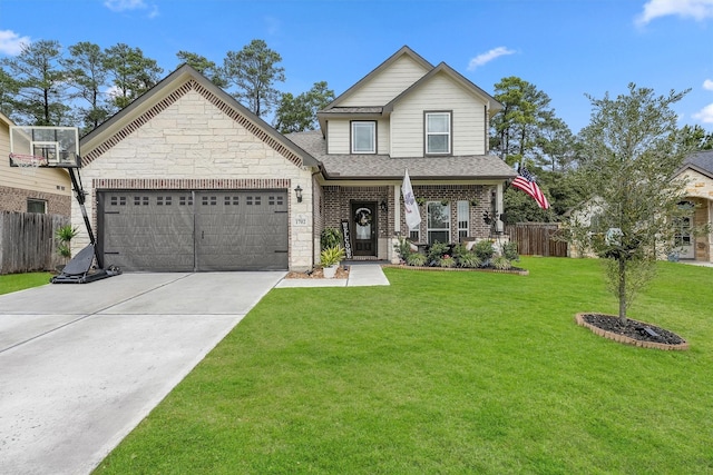 traditional home with a garage, driveway, fence, a front lawn, and brick siding