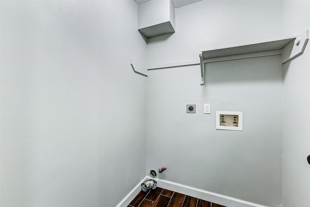 laundry area featuring dark wood-type flooring, gas dryer hookup, washer hookup, laundry area, and hookup for an electric dryer