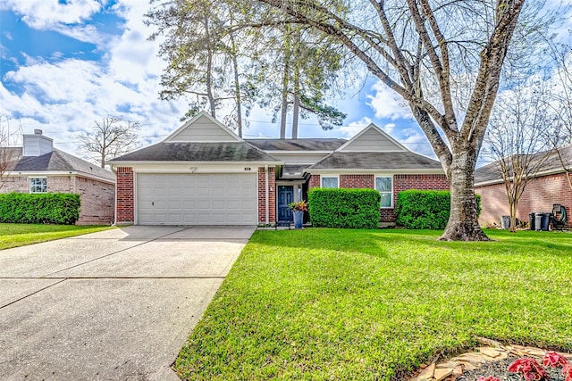 view of front of property with concrete driveway, an attached garage, brick siding, and a front yard