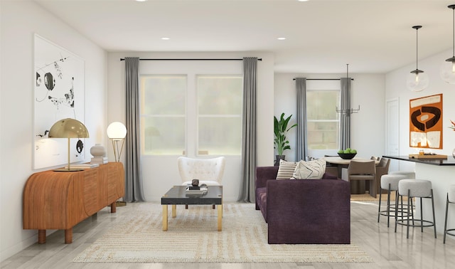 sitting room with wood finished floors and baseboards