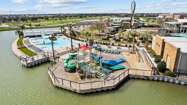 birds eye view of property featuring a water view