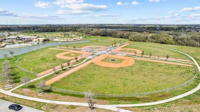 birds eye view of property with a water view