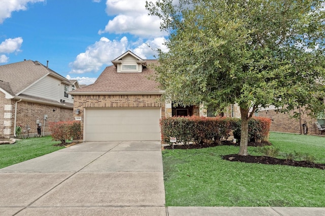 view of front of home featuring a garage, concrete driveway, brick siding, and a front yard