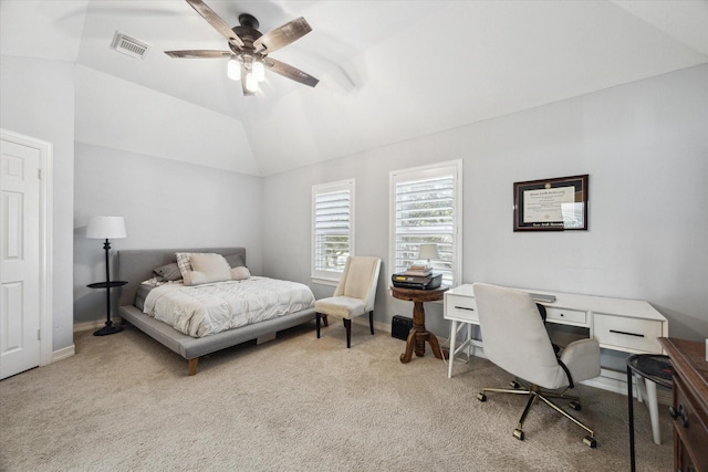 carpeted bedroom with lofted ceiling, visible vents, baseboards, and ceiling fan