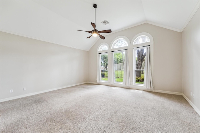 unfurnished room featuring carpet, vaulted ceiling, ceiling fan, baseboards, and visible vents