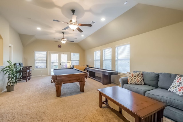 recreation room with french doors, lofted ceiling, recessed lighting, light carpet, and baseboards