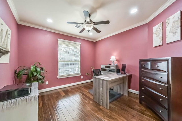 office with ceiling fan, dark wood-type flooring, visible vents, baseboards, and ornamental molding