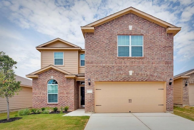 view of front of house with a garage, concrete driveway, brick siding, and a front yard