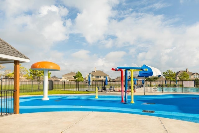 community play area featuring fence