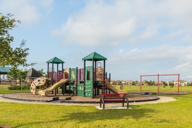 community play area with a yard