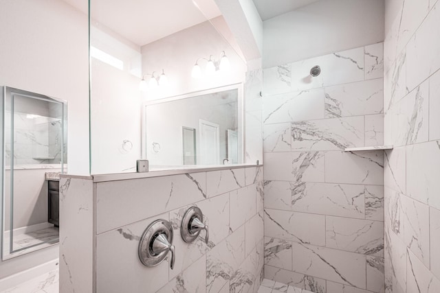 full bath featuring marble finish floor and a walk in shower