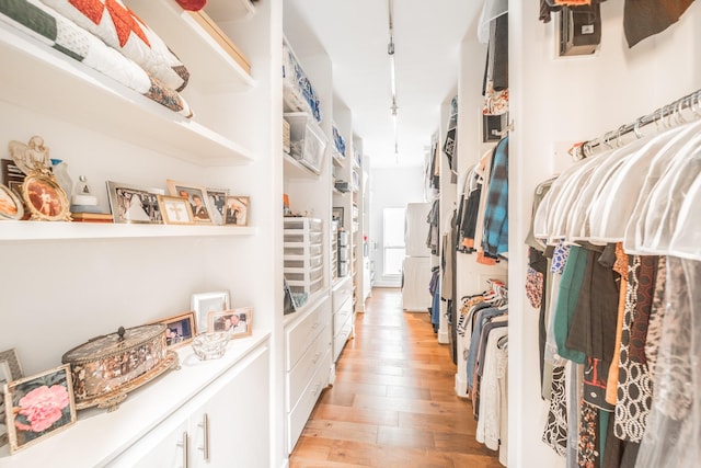 spacious closet featuring light wood finished floors