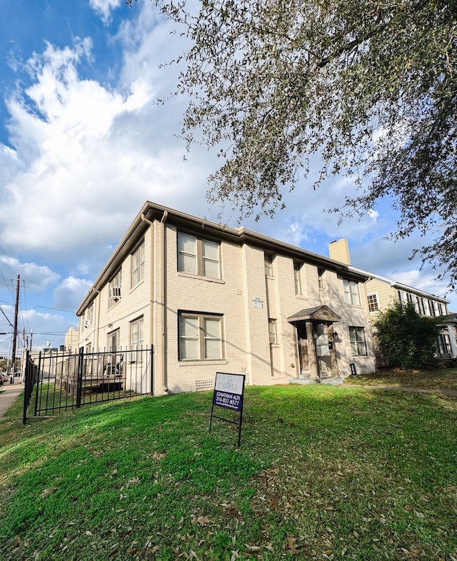 view of property with fence