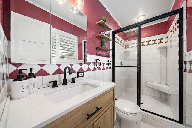 full bath featuring tasteful backsplash, toilet, vanity, a shower stall, and tile walls