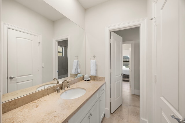 bathroom featuring vanity and tile patterned floors