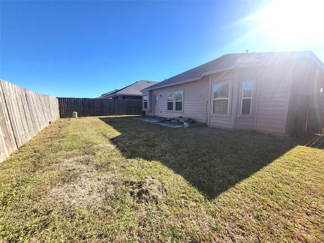 view of yard featuring a fenced backyard