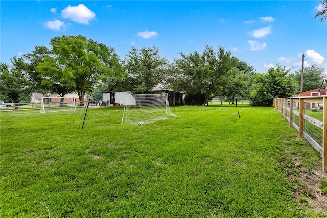 view of yard featuring fence