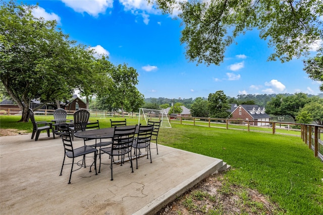 view of yard featuring a patio area and a fenced backyard