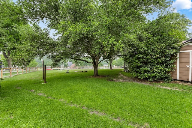 view of yard featuring fence