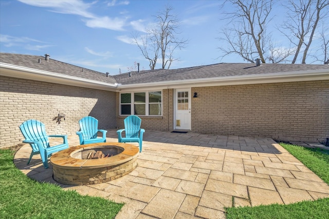 view of patio / terrace featuring a fire pit