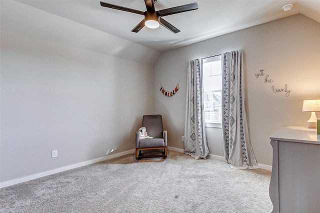 unfurnished room with lofted ceiling, carpet flooring, baseboards, and ceiling fan