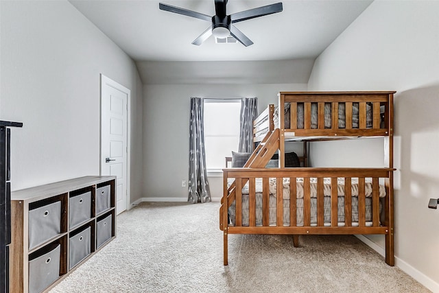 carpeted bedroom with visible vents and baseboards