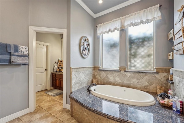 bathroom featuring a healthy amount of sunlight, a garden tub, crown molding, and tile patterned floors