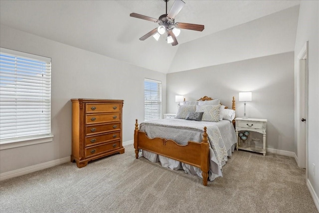 carpeted bedroom featuring a ceiling fan, vaulted ceiling, and baseboards