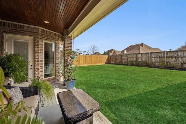 view of yard featuring a fenced backyard