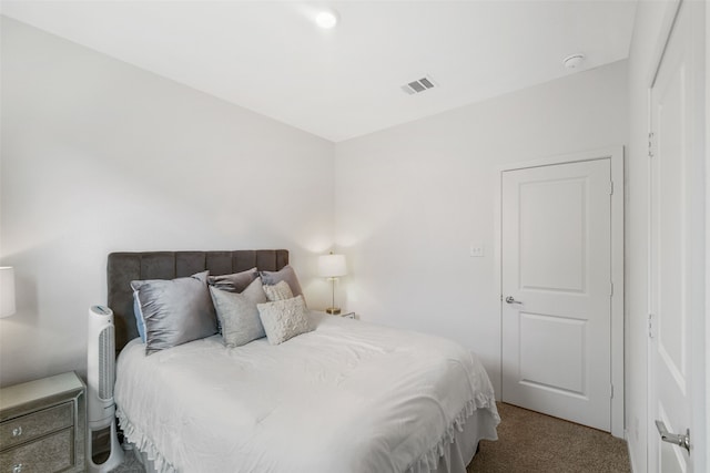 bedroom featuring carpet flooring and visible vents