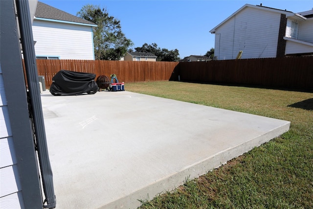 view of patio with a fenced backyard