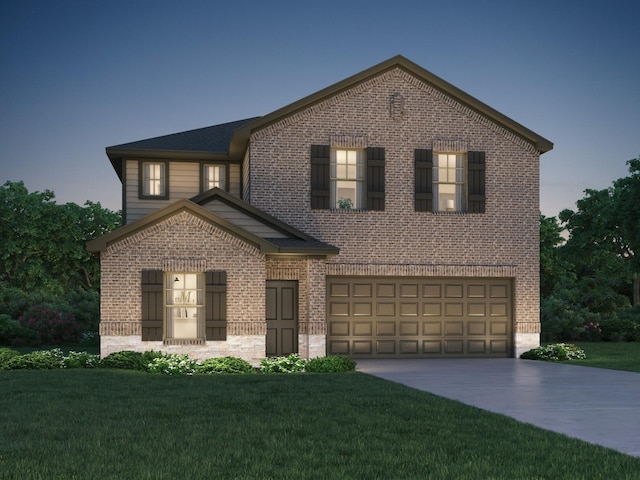 view of front of property with driveway, a garage, a front yard, and brick siding