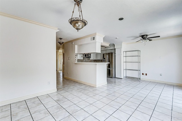 interior space featuring light tile patterned floors, visible vents, baseboards, and a ceiling fan