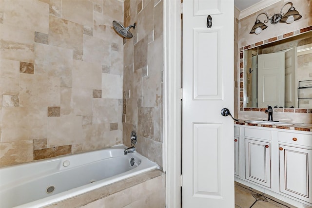 full bathroom with crown molding, tiled shower / bath, tile walls, vanity, and tile patterned flooring