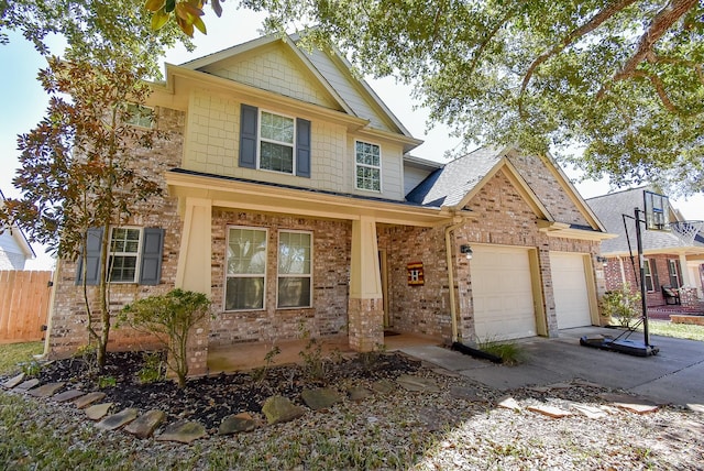 view of front of property with a garage, brick siding, fence, and driveway