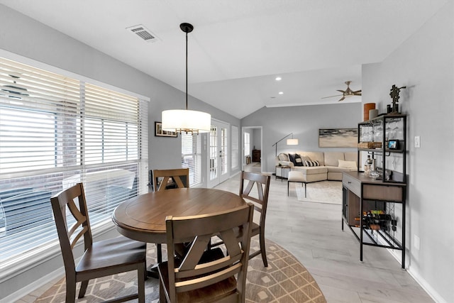 dining space with vaulted ceiling, recessed lighting, visible vents, and baseboards