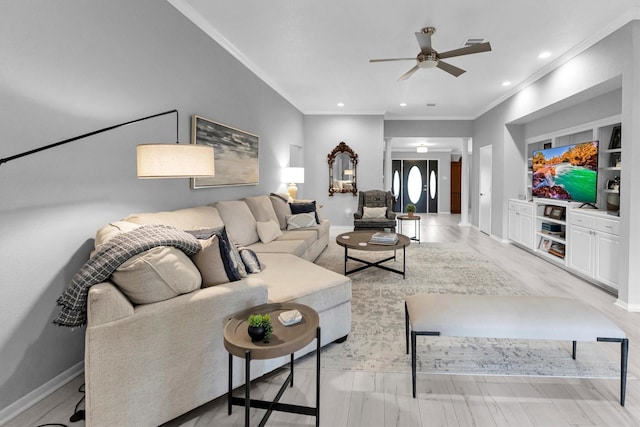 living area with crown molding, recessed lighting, visible vents, ceiling fan, and baseboards