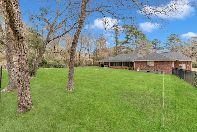 view of yard with fence