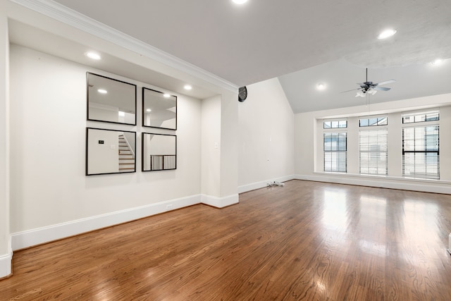 unfurnished room with ceiling fan, lofted ceiling, recessed lighting, wood finished floors, and baseboards