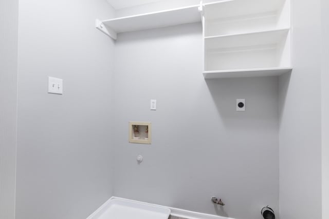 laundry area featuring laundry area, washer hookup, electric dryer hookup, and hookup for a gas dryer