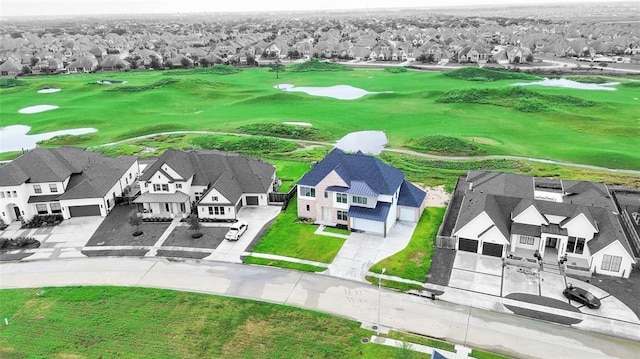 bird's eye view featuring view of golf course and a residential view