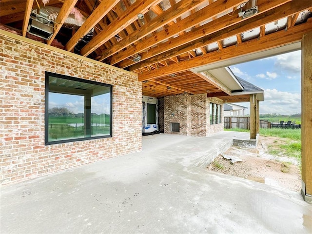 view of patio featuring fence