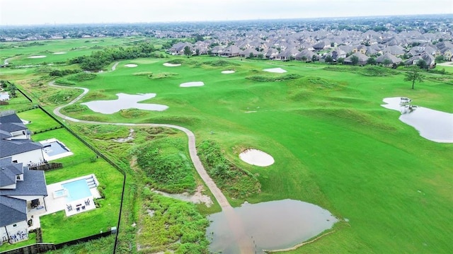 bird's eye view featuring golf course view and a residential view