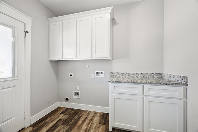 clothes washing area with cabinet space, baseboards, dark wood-style flooring, washer hookup, and electric dryer hookup