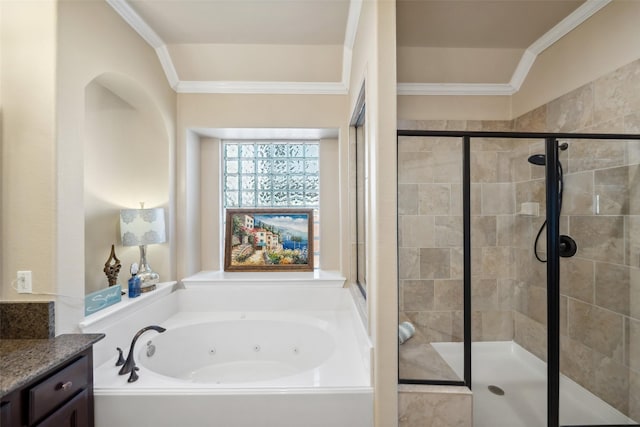 bathroom featuring a jetted tub, a stall shower, crown molding, and vanity