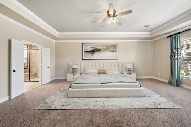 2405 Pebble Lodge Ln, Friendswood, TX 77546 - carpeted bedroom with crown molding, baseboards, a tray ceiling, connected bathroom, and a ceiling fan