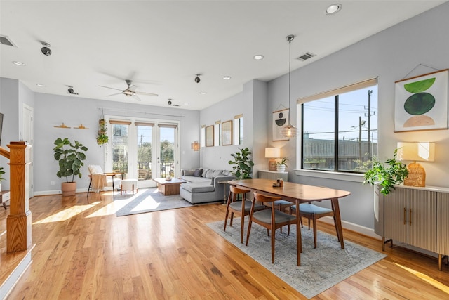 living room featuring ceiling fan, recessed lighting, visible vents, baseboards, and light wood finished floors