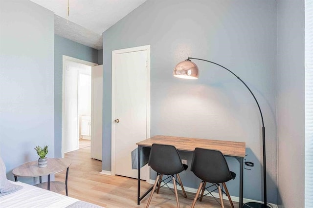 home office featuring wood finished floors